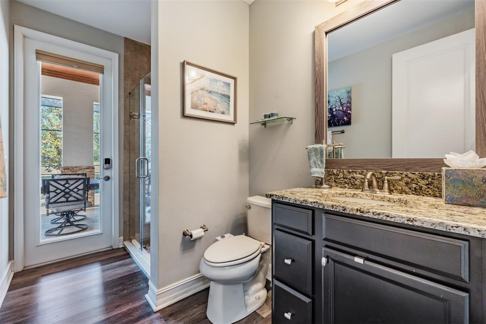 Pool bath, located adjacent to downstairs BR/Craftroom
