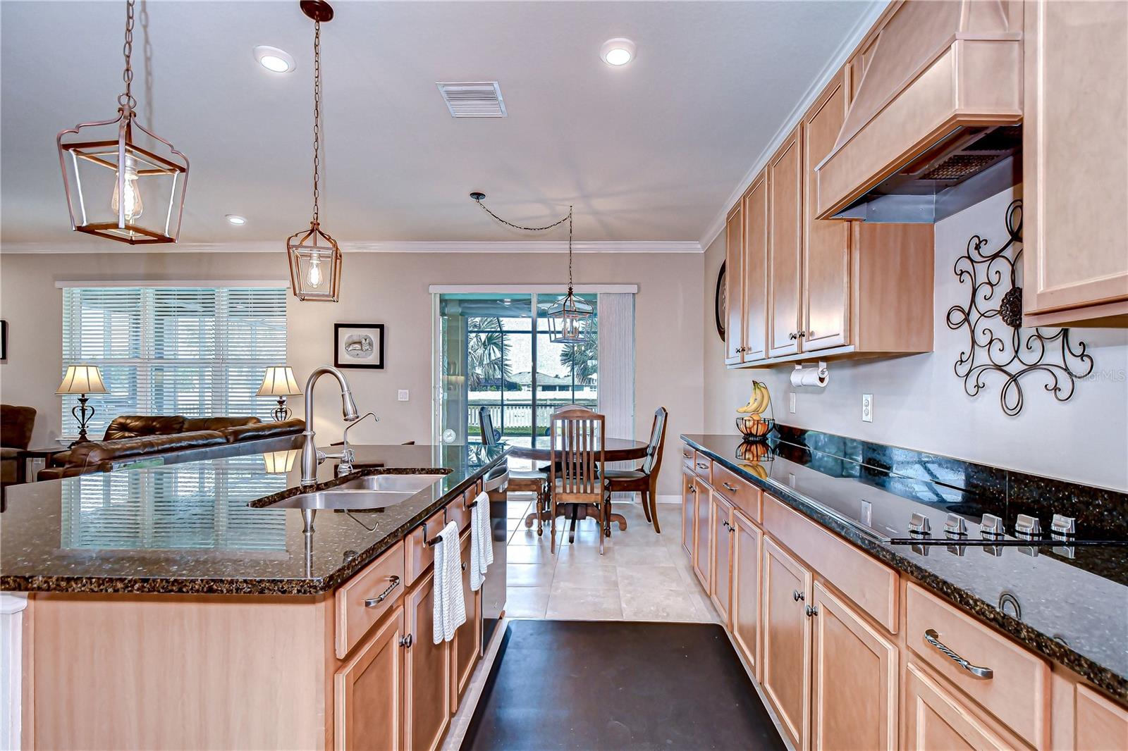 Check out the  stainless appliances, built-in oven, and a cozy dinette area!