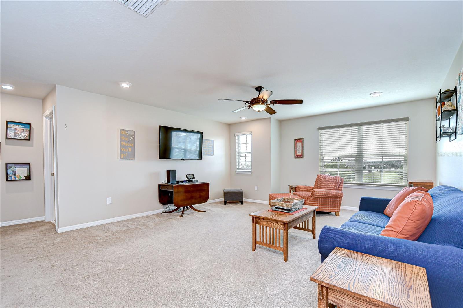The spacious loft provides the perfect area for a media room, playroom, or second living space!