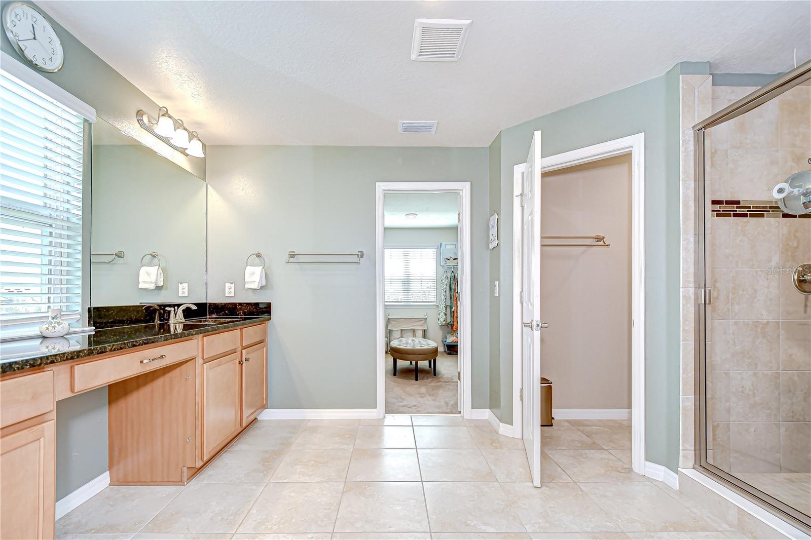 En-suite bath offers large walk-in shower and dual vanities!