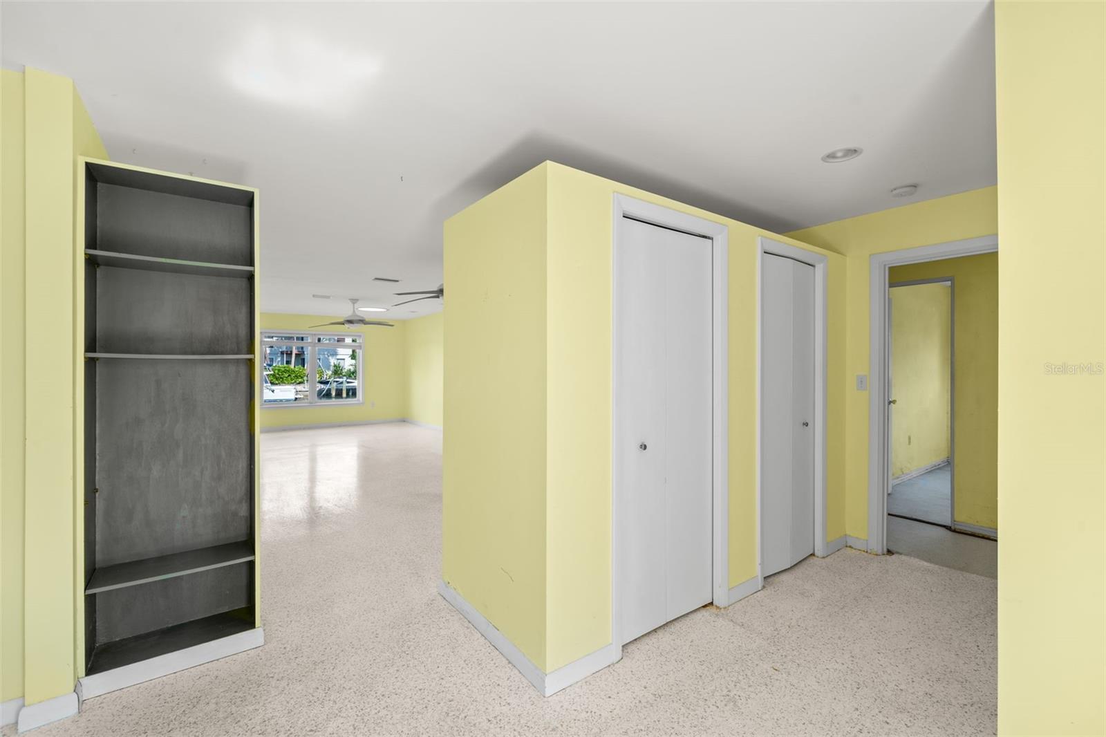 Inviting Entry with closet space and storage. Imagine replacing this with more contemporary  storage and a bench seating...