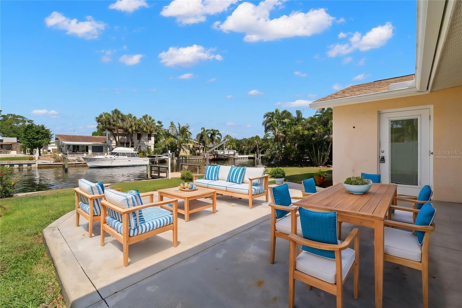 Back yard with open patio for entertaining (Virtually Staged)