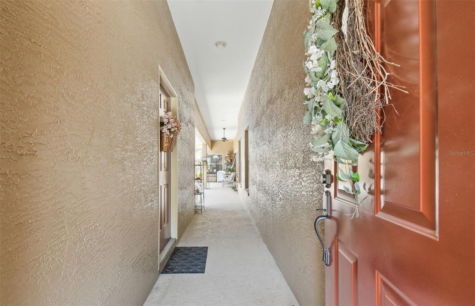 Entry into Courtyard w/In-Law Suite on Left