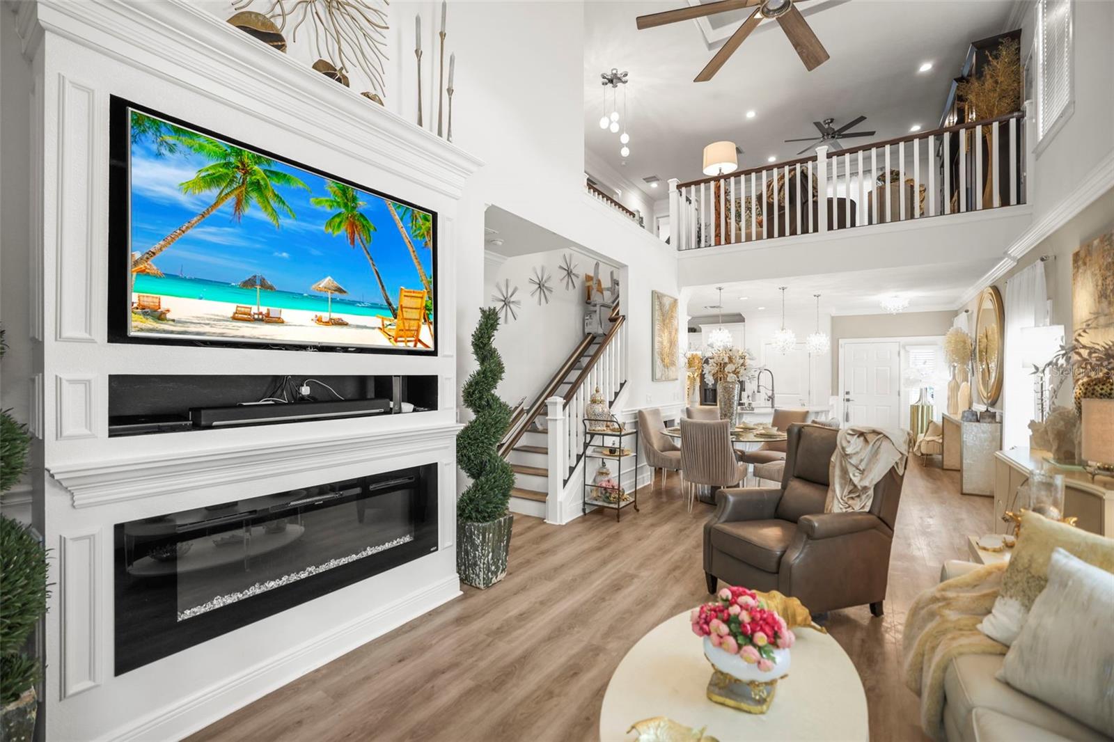 Large built-in TV and electric fireplace