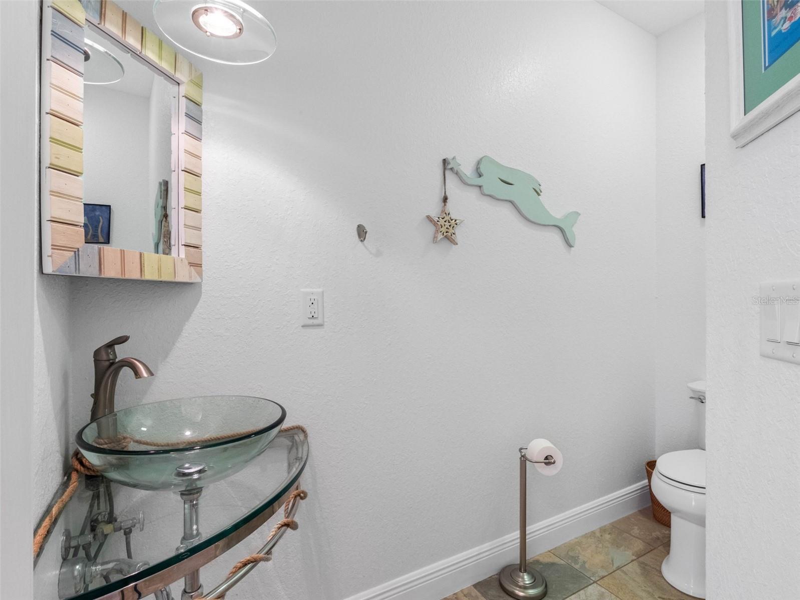 Half bathroom off of the kitchen