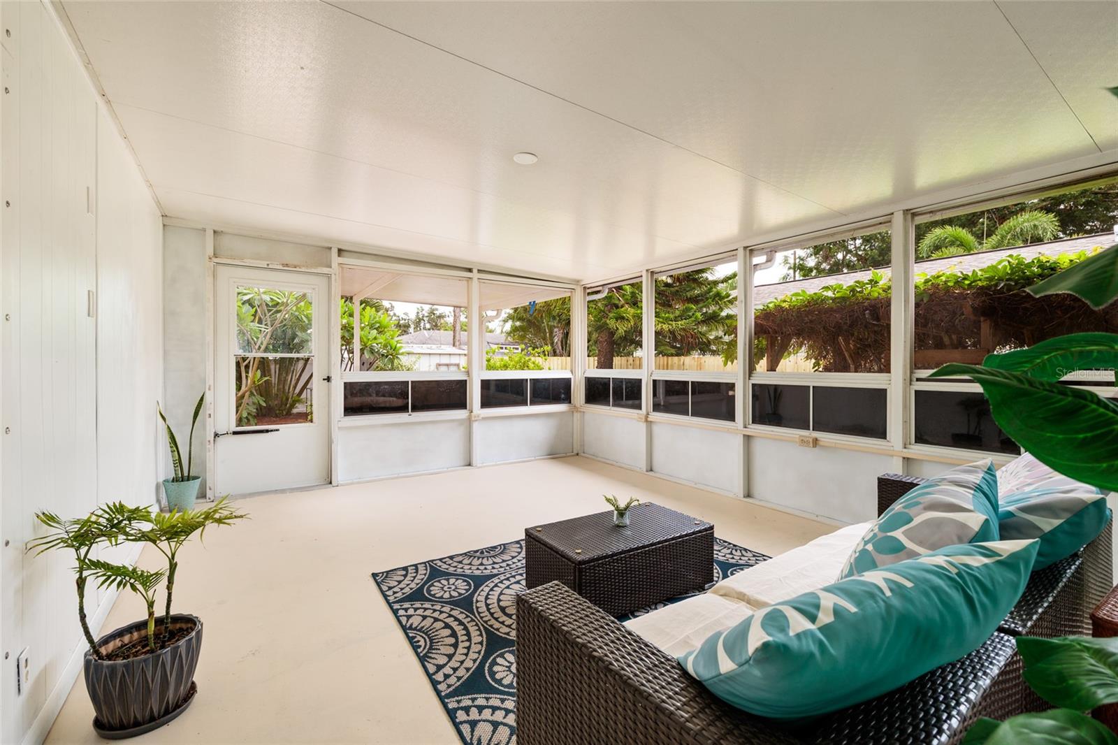 anoramic screened porch with vinyl windows