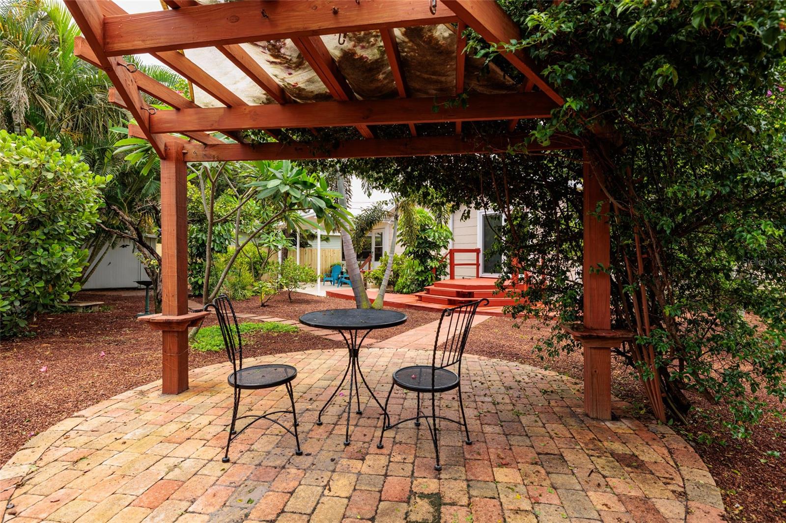 Manicured garden, pergola