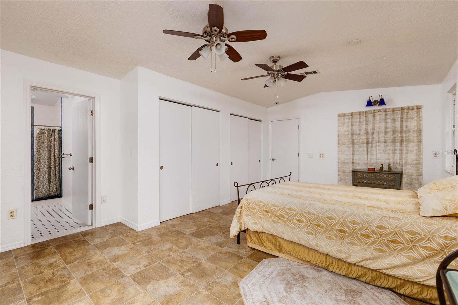 Primary bedroom & bath suite