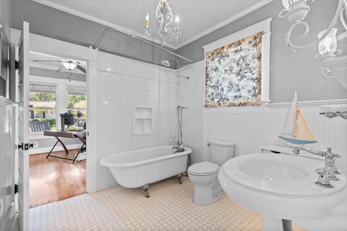 Beautiful claw foot tub.  Gorgeous detail in the door knobs which are throughout the house.