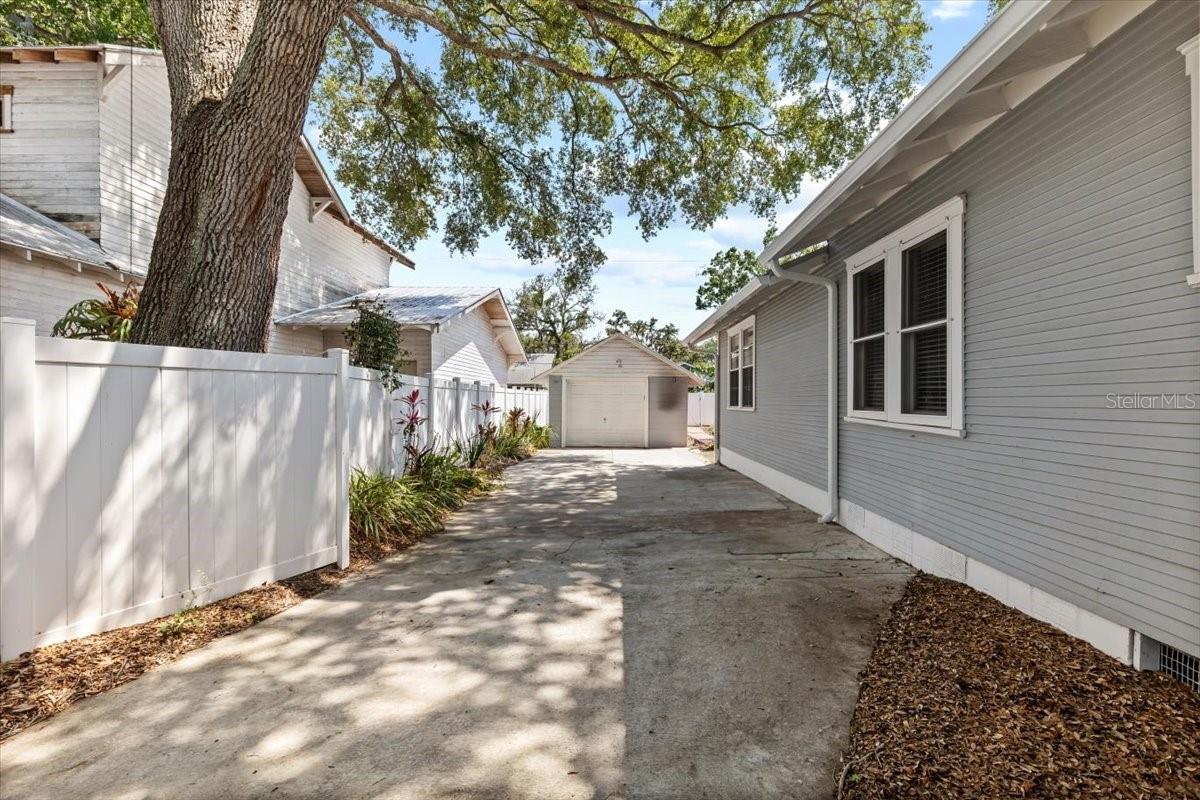 Driveway view to detached garage