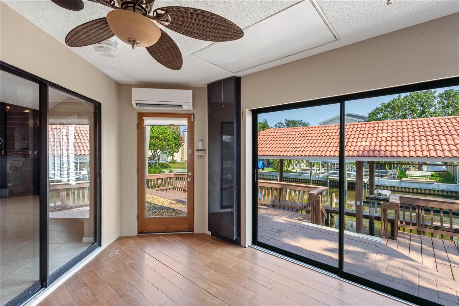 Enclosed Florida Room leading to deck