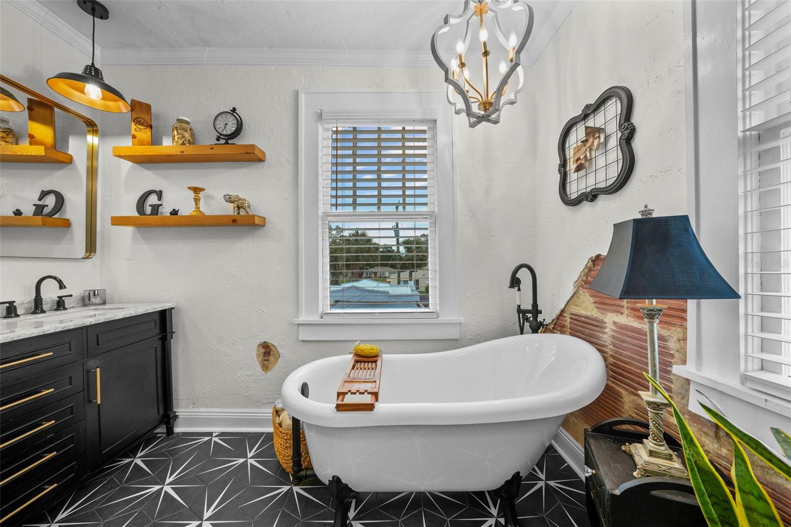 Claw foot soaking tub with sunset views