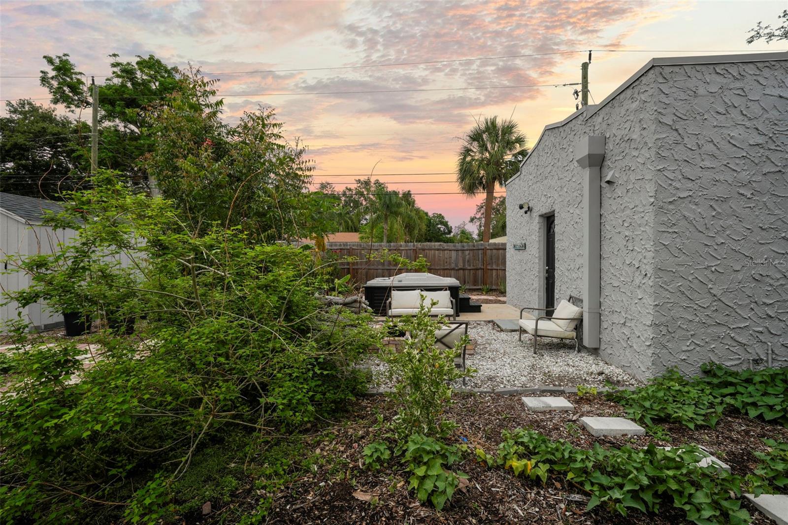 Fire pit and hot tub are secluded for privacy