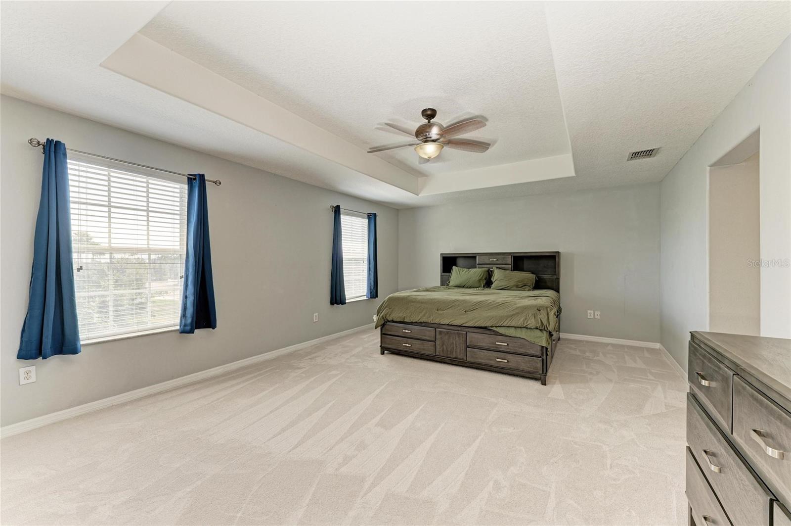 Primary bedroom.  En suite bathroom and 2 walk in closets to the right