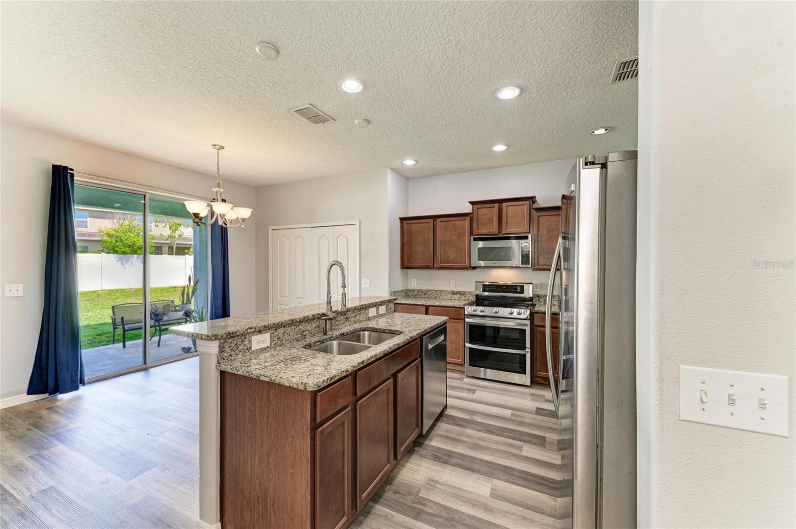 Kitchen with eating area and pantry closet