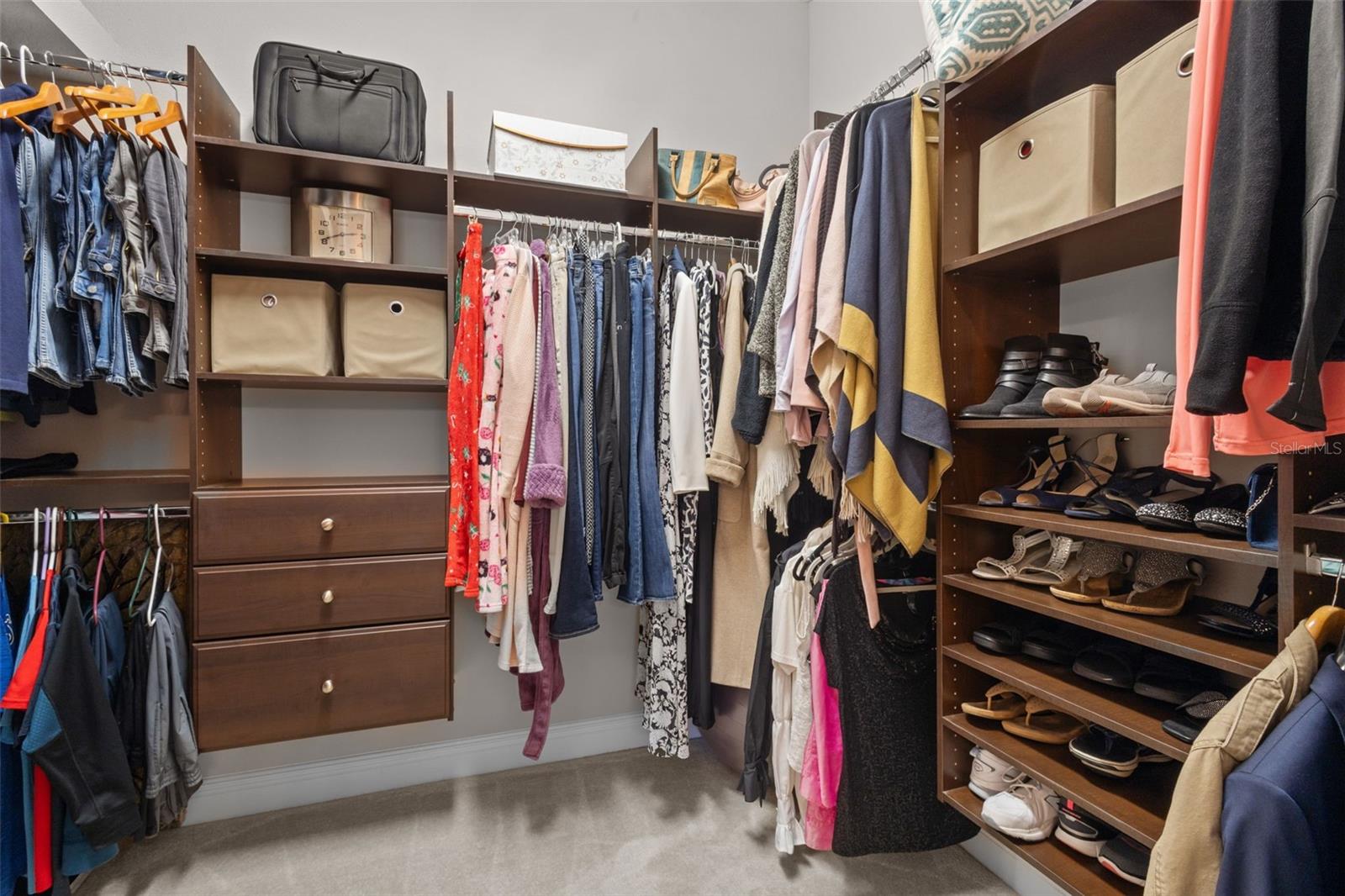 Primary Bedroom Walk in closet with custom closet
