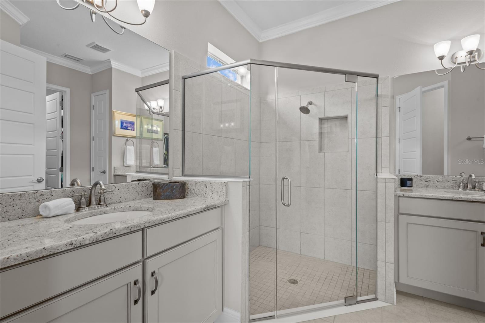 En Suite Primary Bathroom with double sinks & Walk in shower