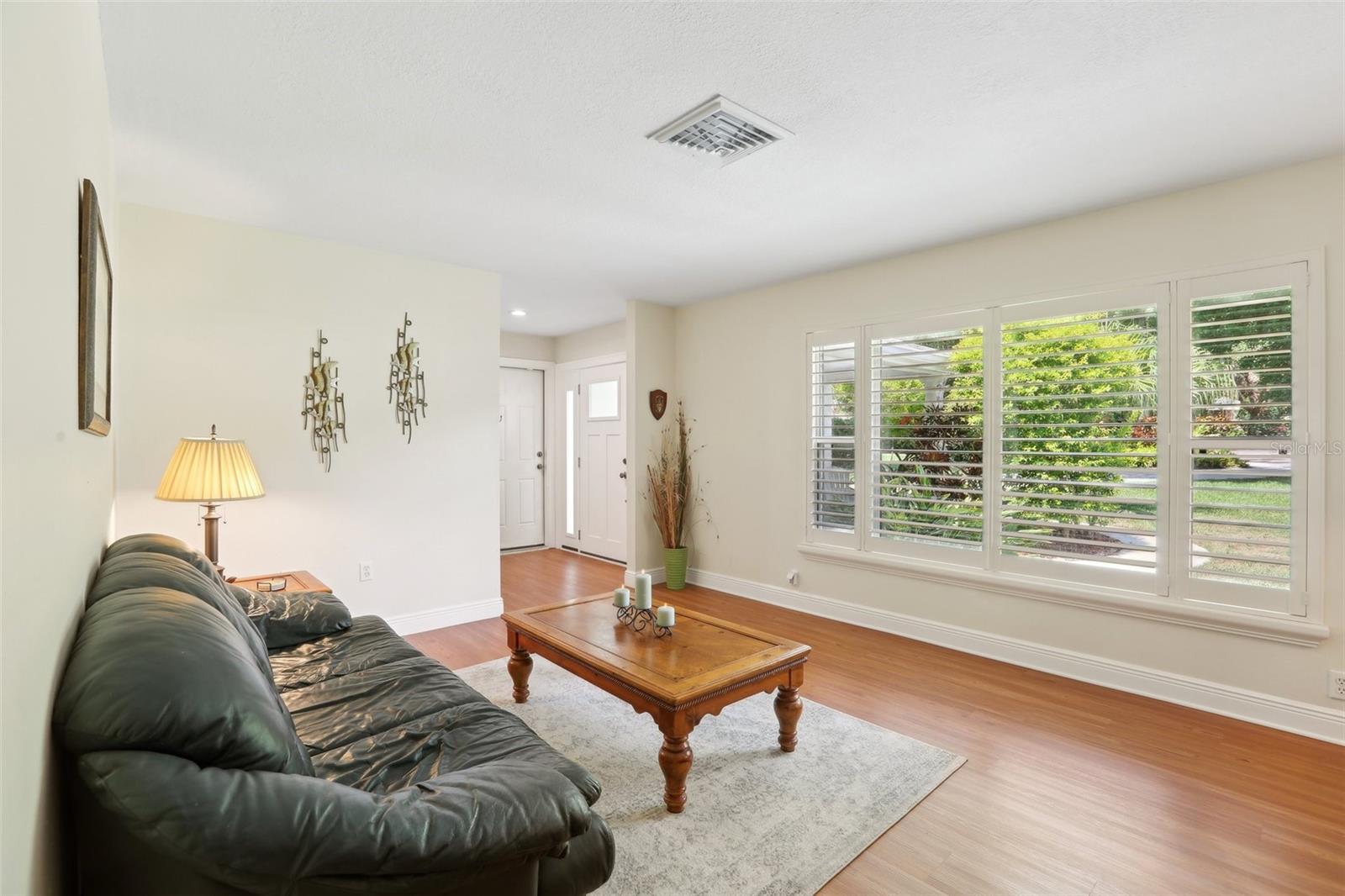 Living Room, custom shutters, laminate flooring