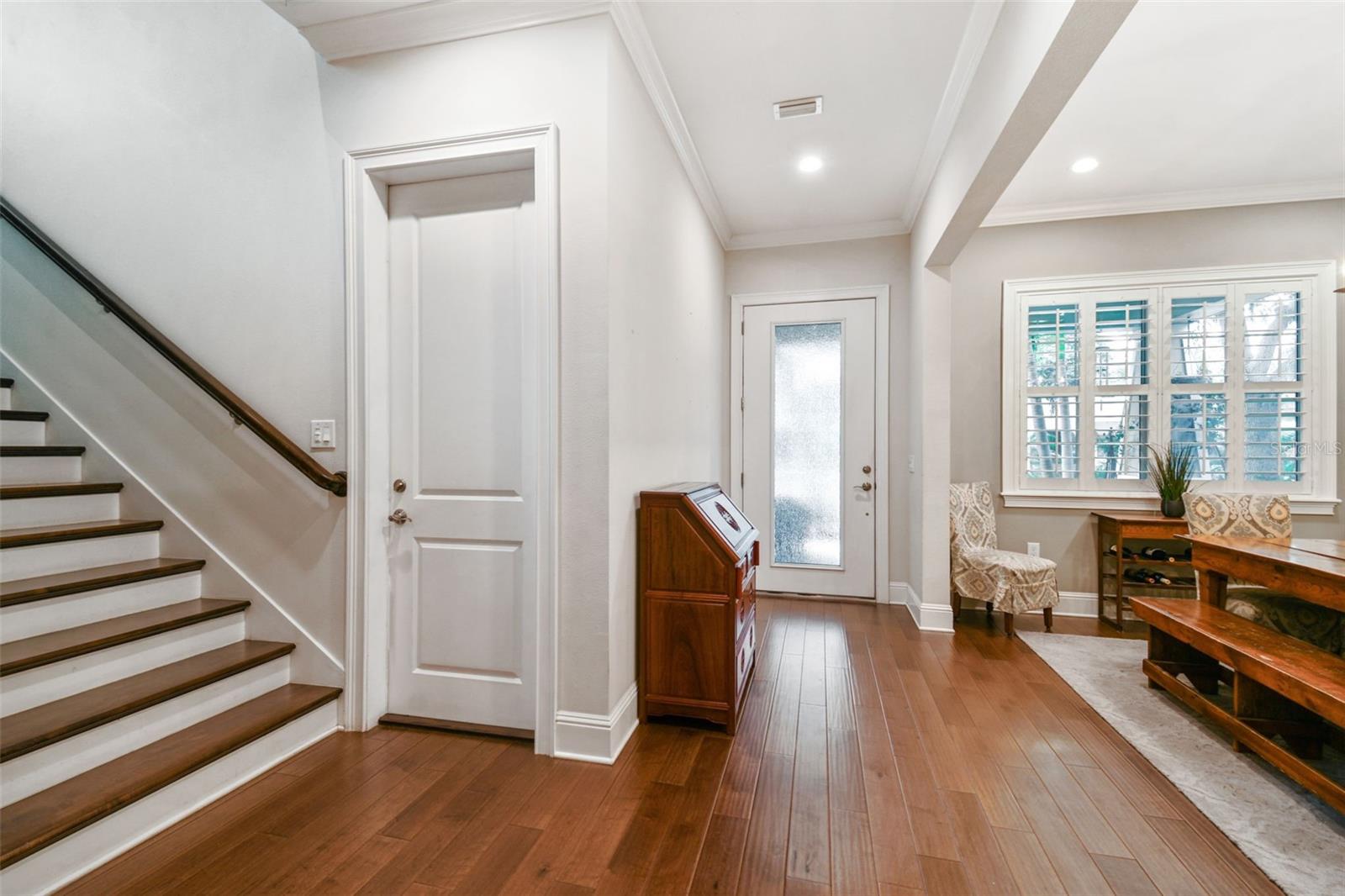 Foyer and maple staircase