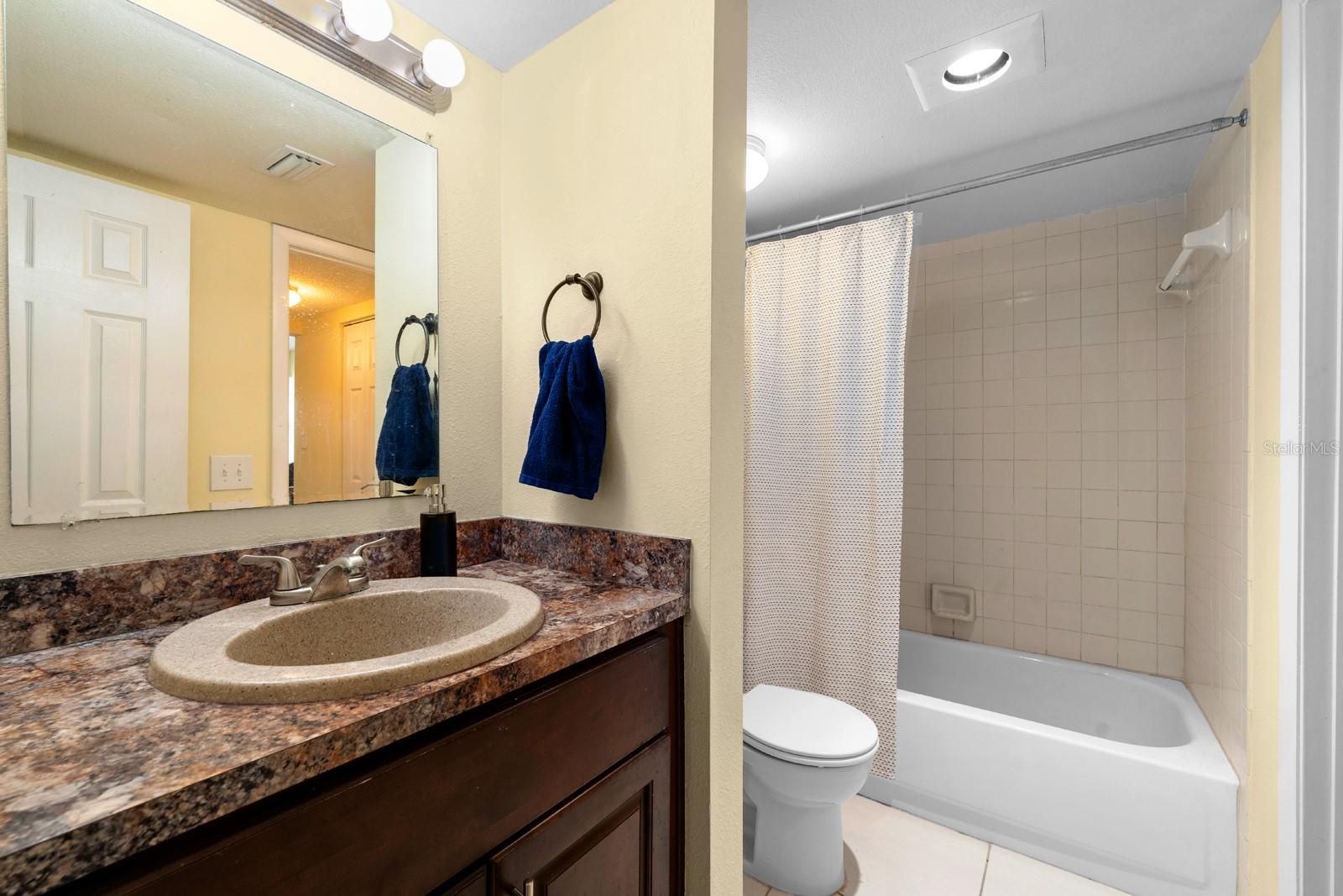 Guest bathroom - private access from hallway & bedroom