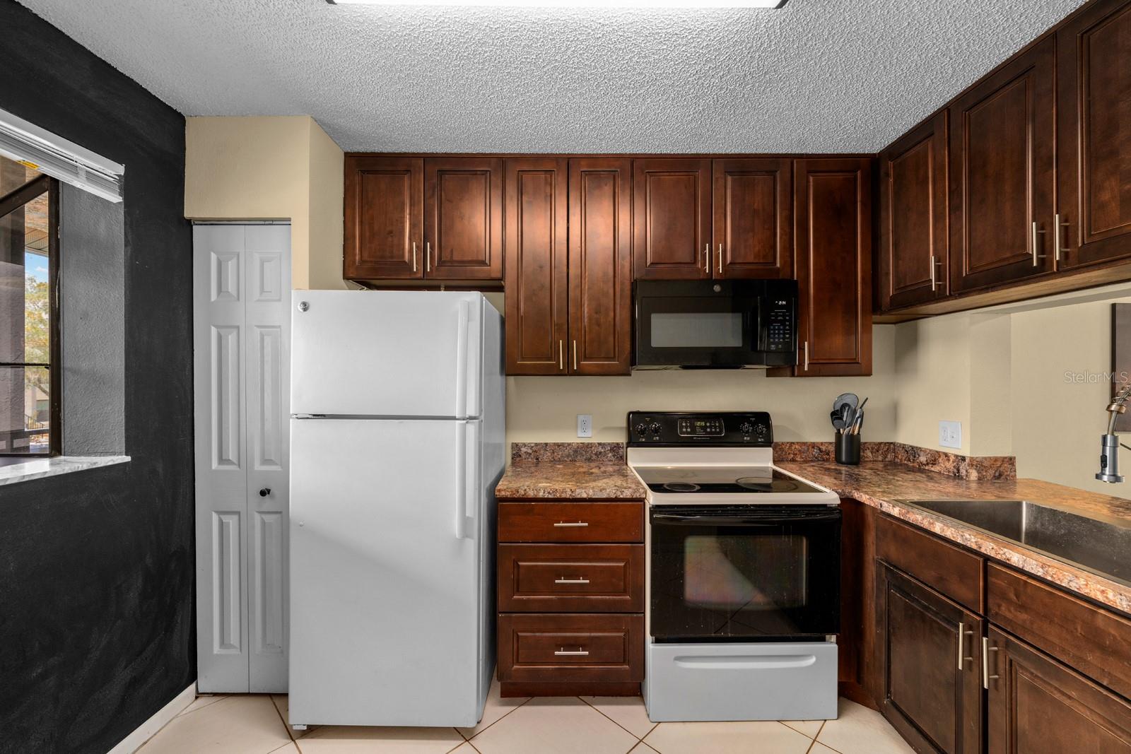 Kitchen with closet pantry storage