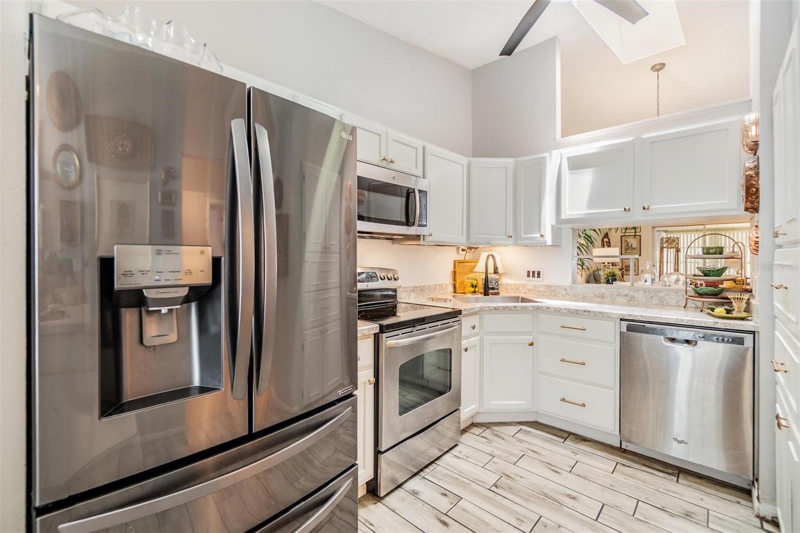 Great updated kitchen with stainless steel appliances.