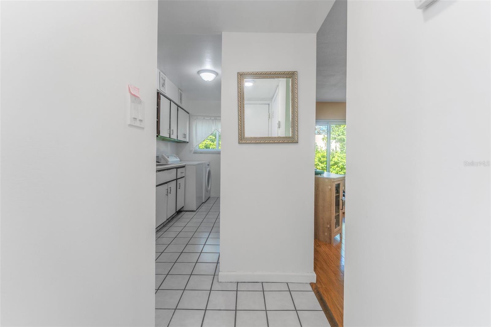Entryway into kitchen and living room