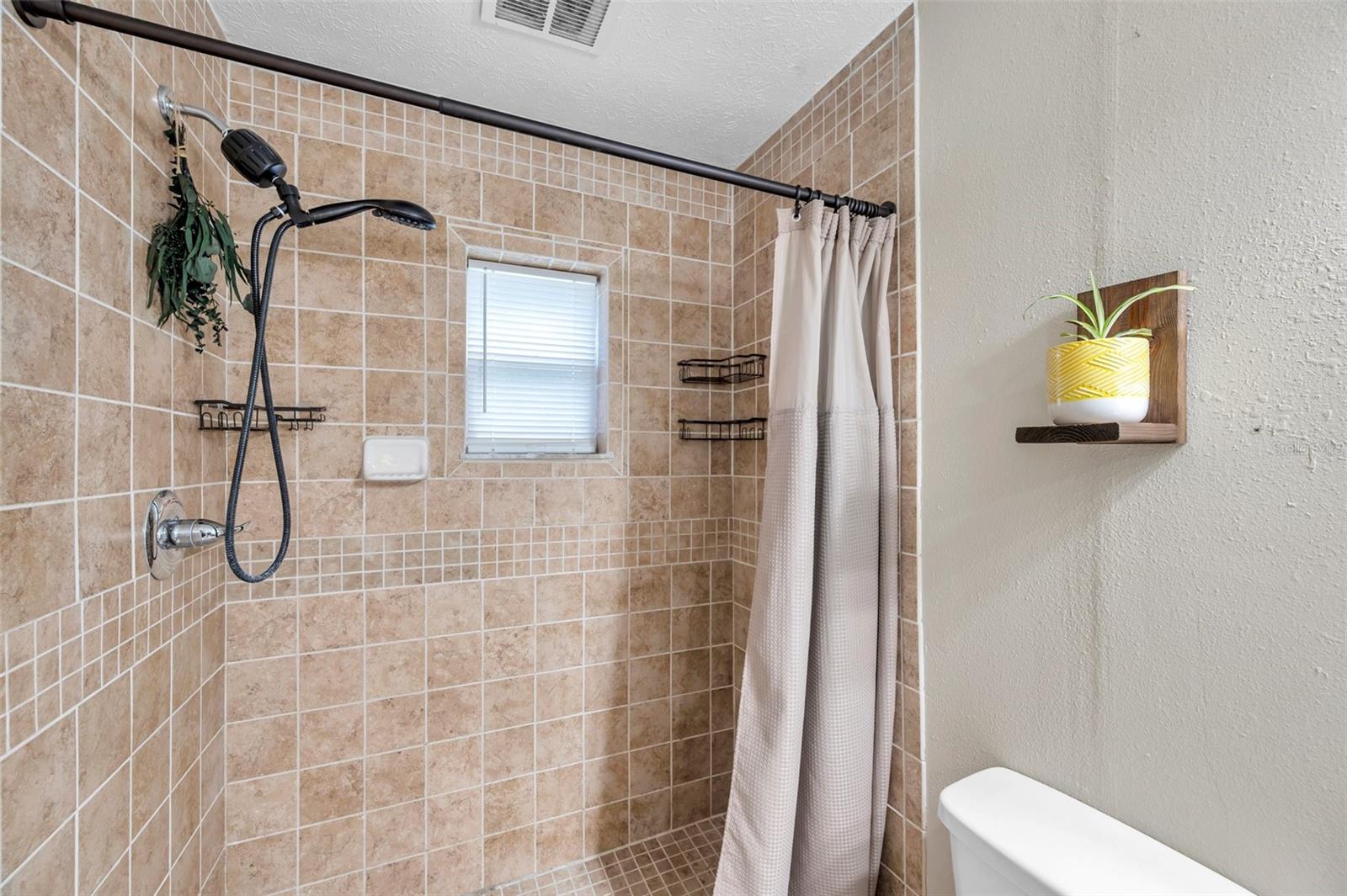 Primary suite w/Private door to outside.