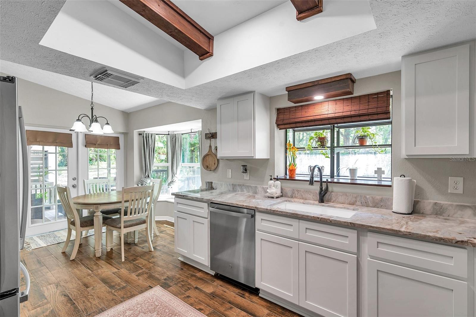 Brand New Kitchen and dining area tile flooring.