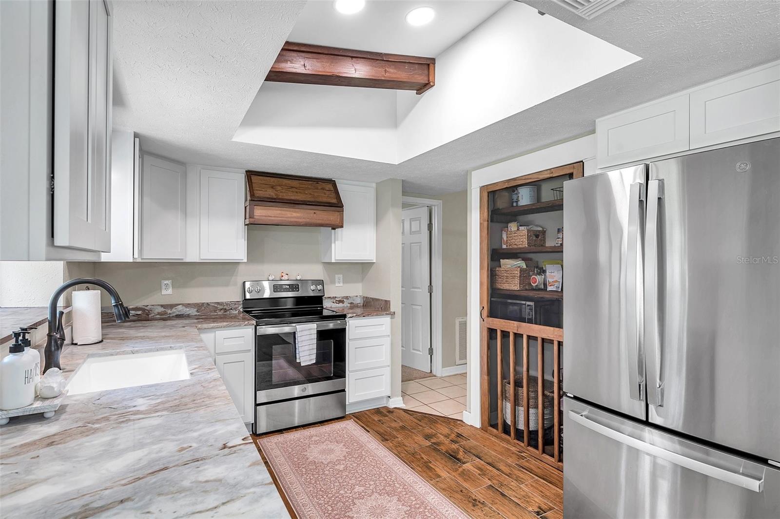 BEAUTIFULLY remodeled Kitchen w/ many lighting extras.