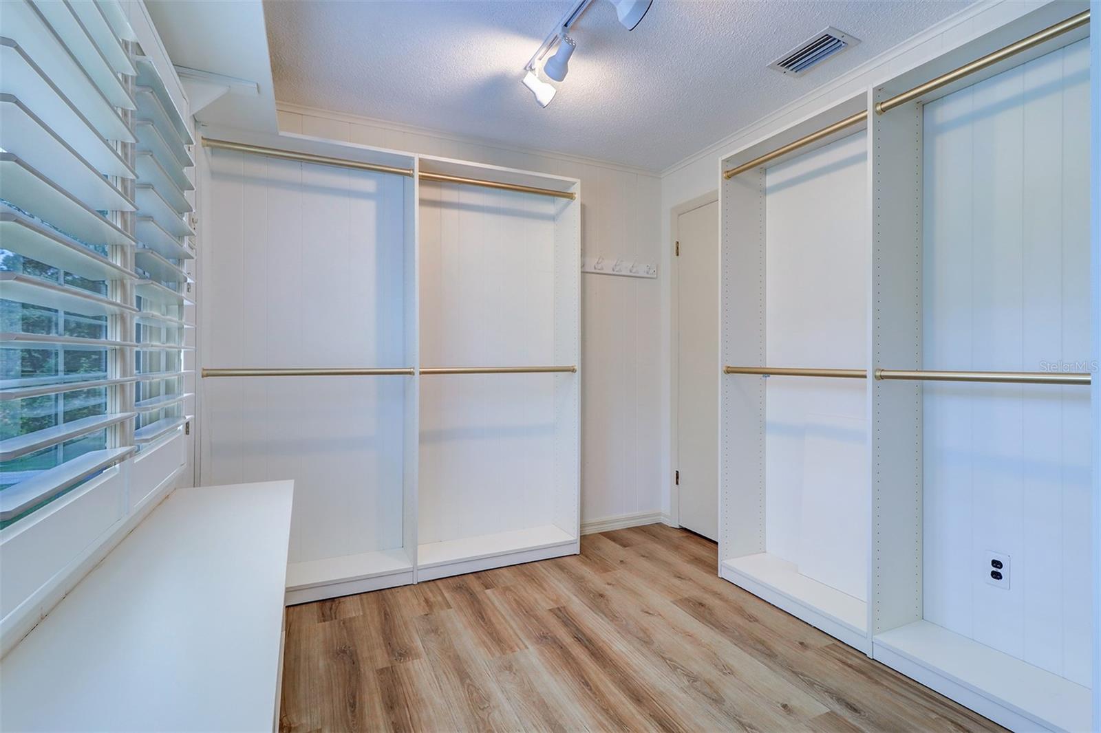 Primary Bedroom walk-in closet