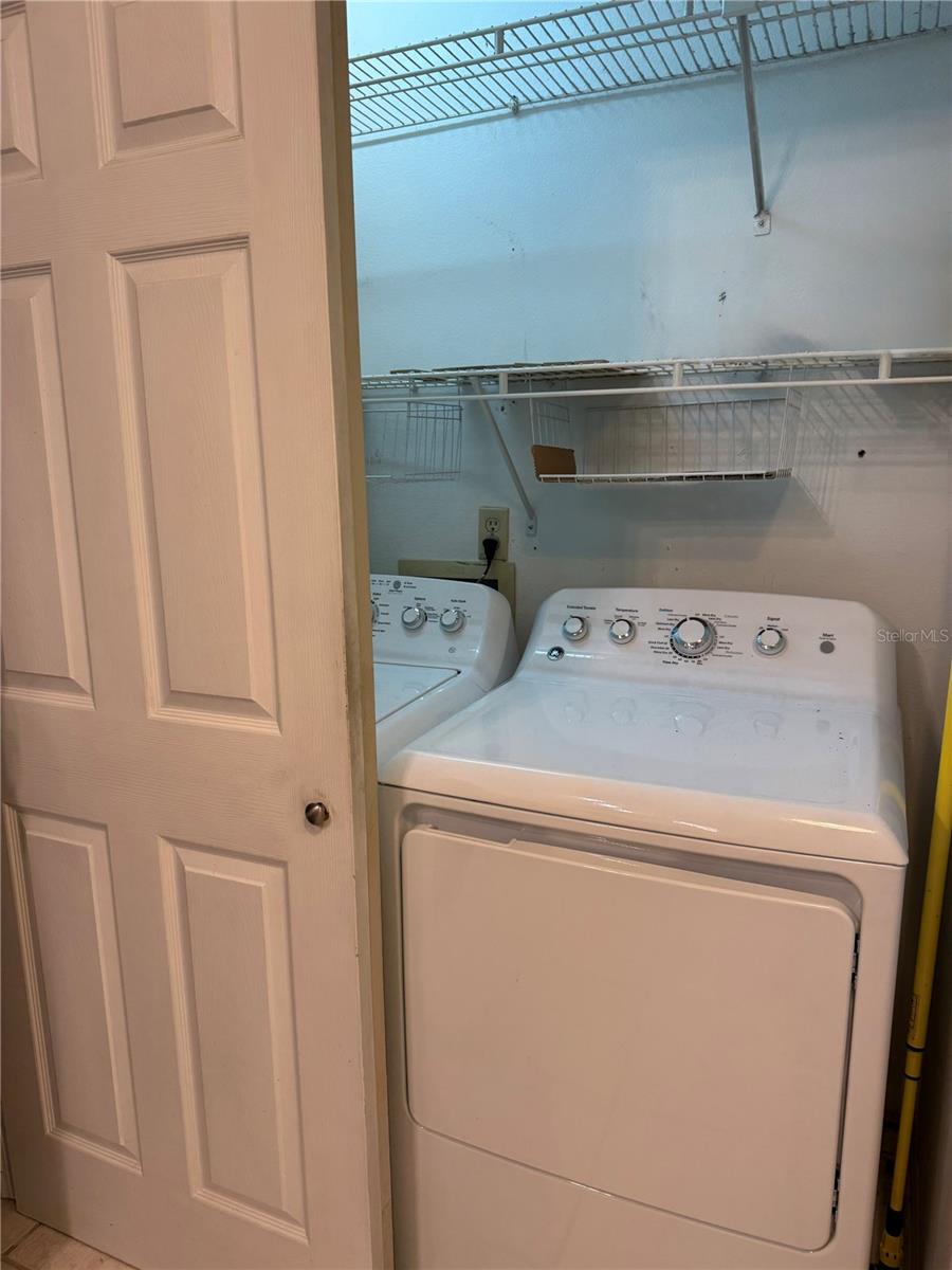 Full size laundry is right in the kitchen closet.