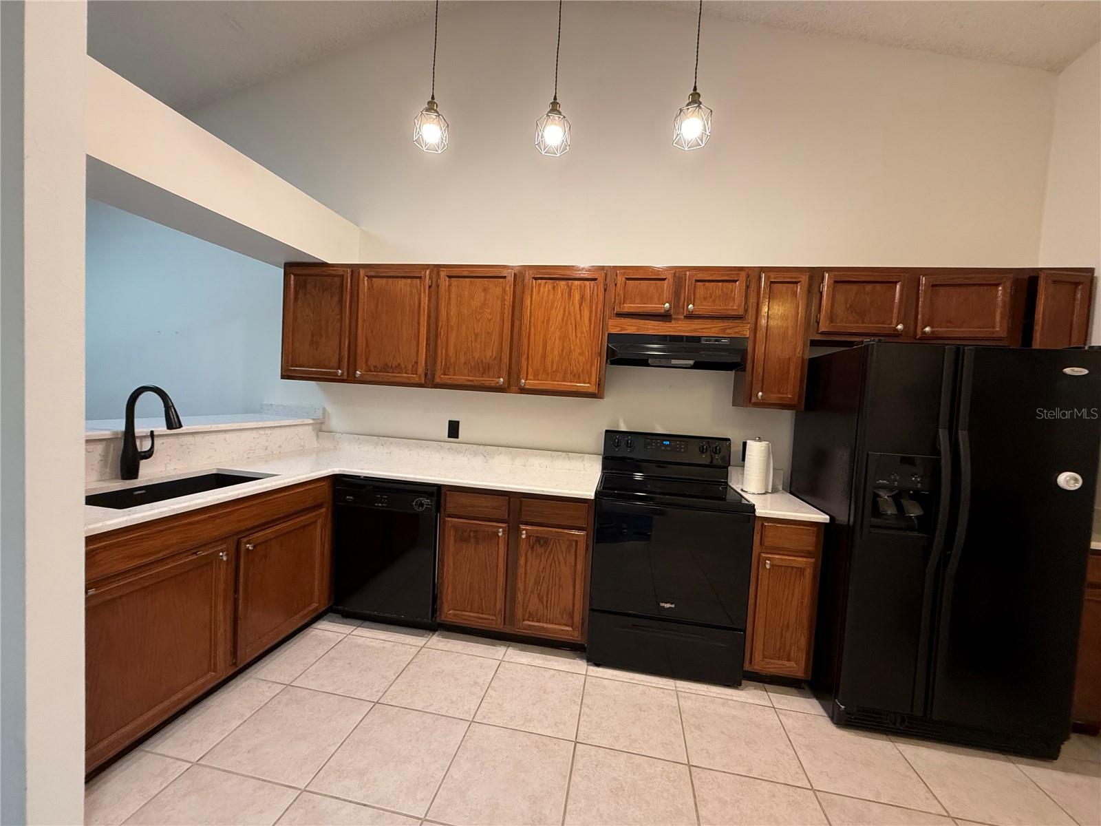 The spacious kitchen is open to the great room and dining room.