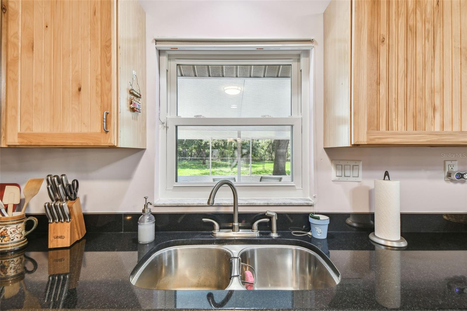 Kitchen w/view of Lanai and Yard