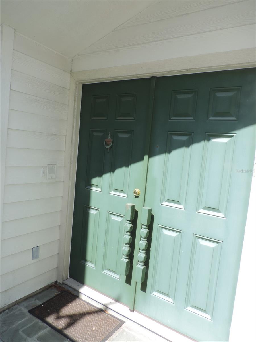 Entryway: Double wooden doors