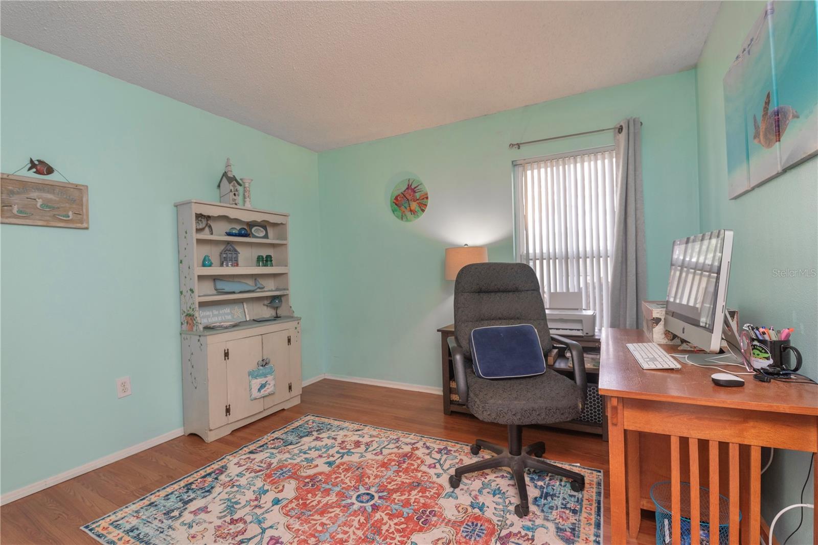 Third bedroom being used as an office.