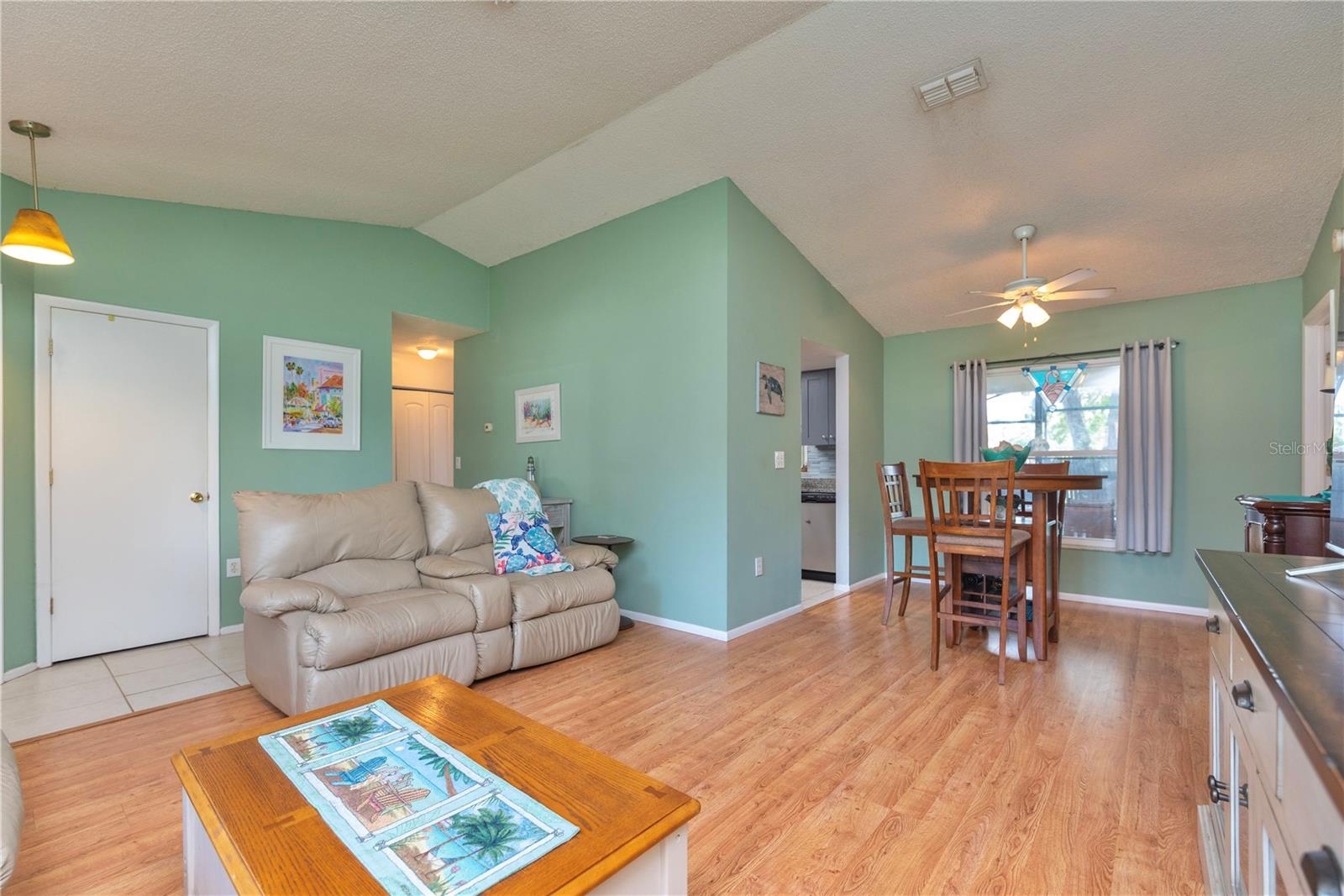 Living room with cathedral ceilings.