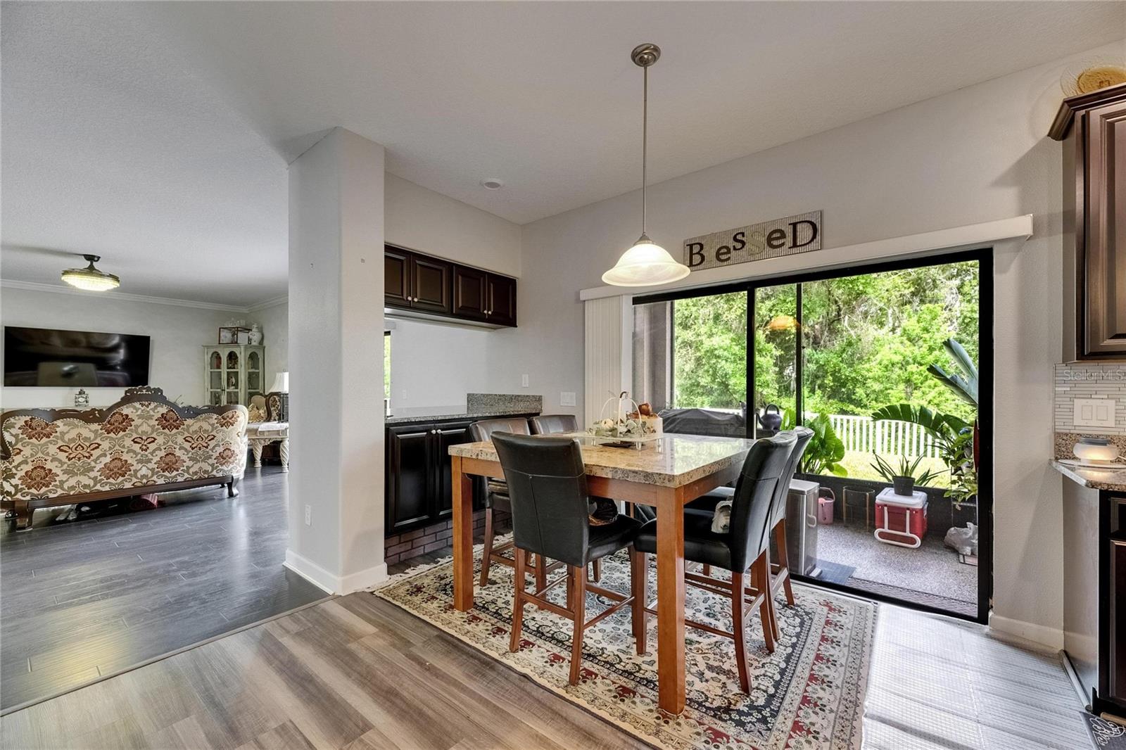 Enjoy your morning coffee in the spacious kitchen nook, perfectly positioned to take in peaceful conservation views
