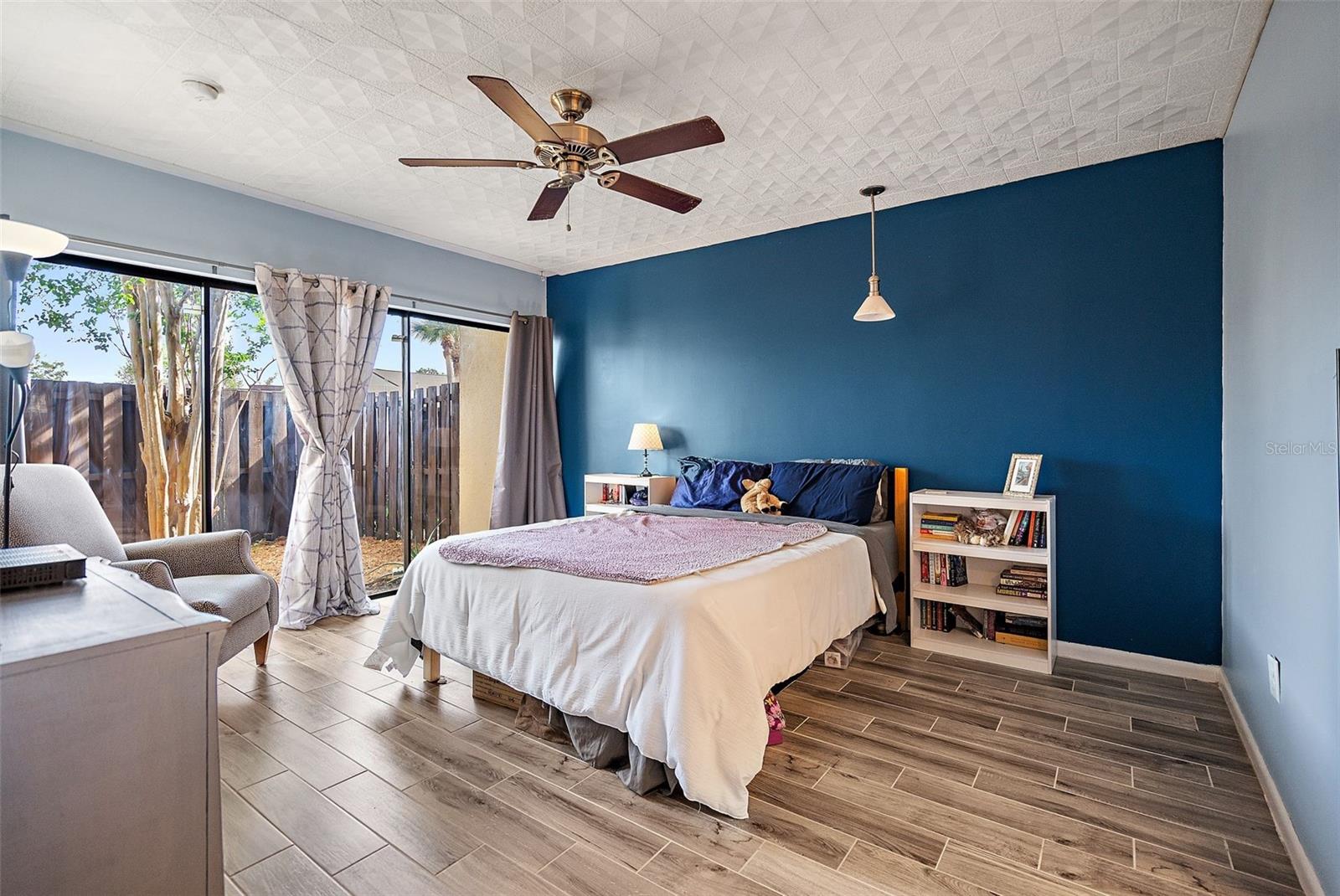 Bedroom also shines with a wall of sliding doors to the private courtyard