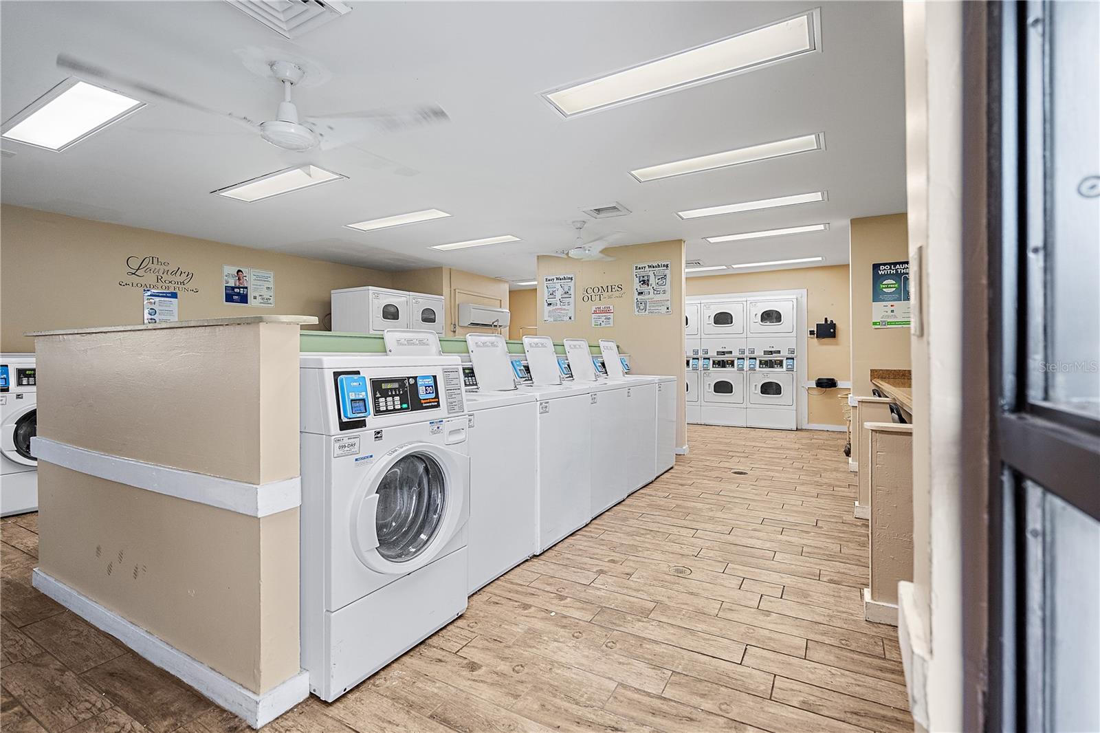 Large laundry room just across from the unit