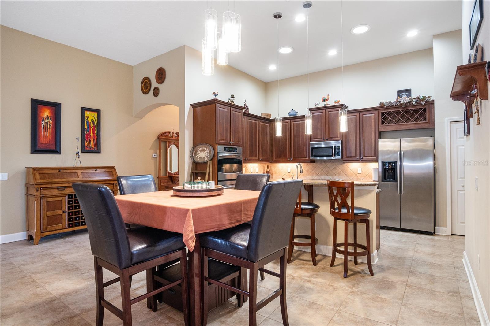 Breakfast Bar Open to Nook and Family Room