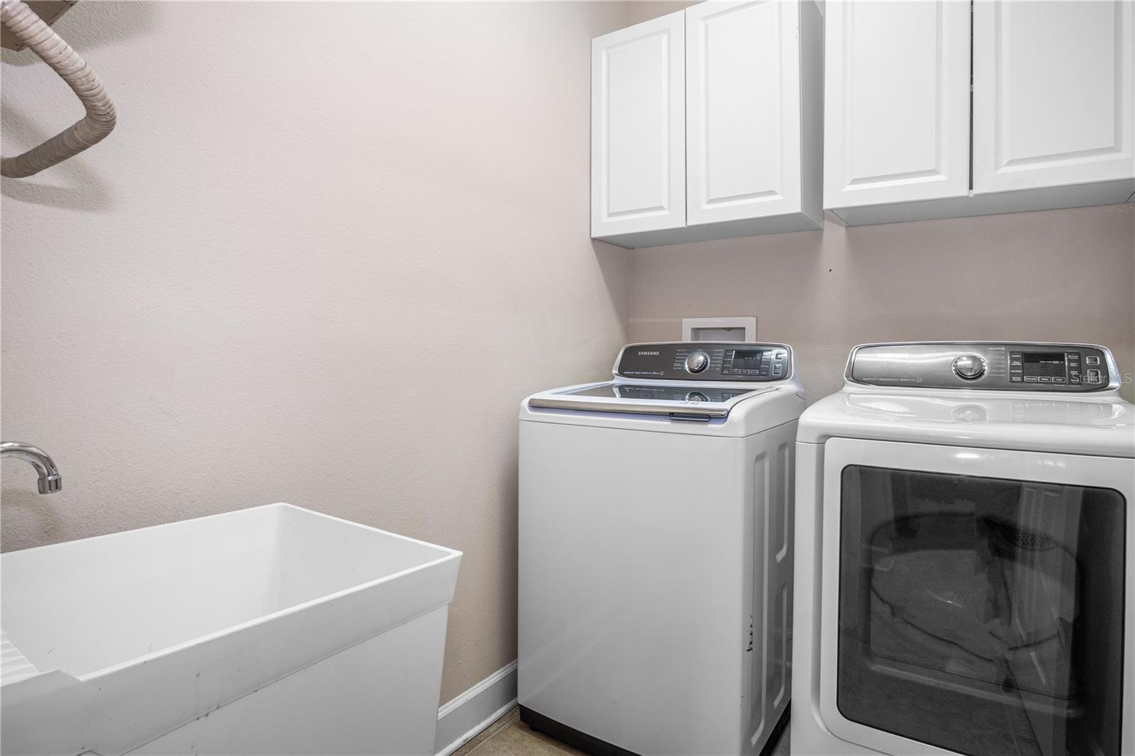 Large Separate Laundry Room with Tub