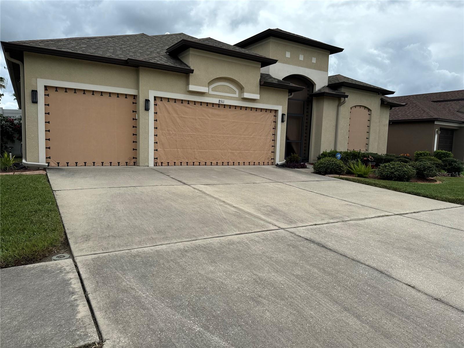 Doors are protected by hurricane fabric