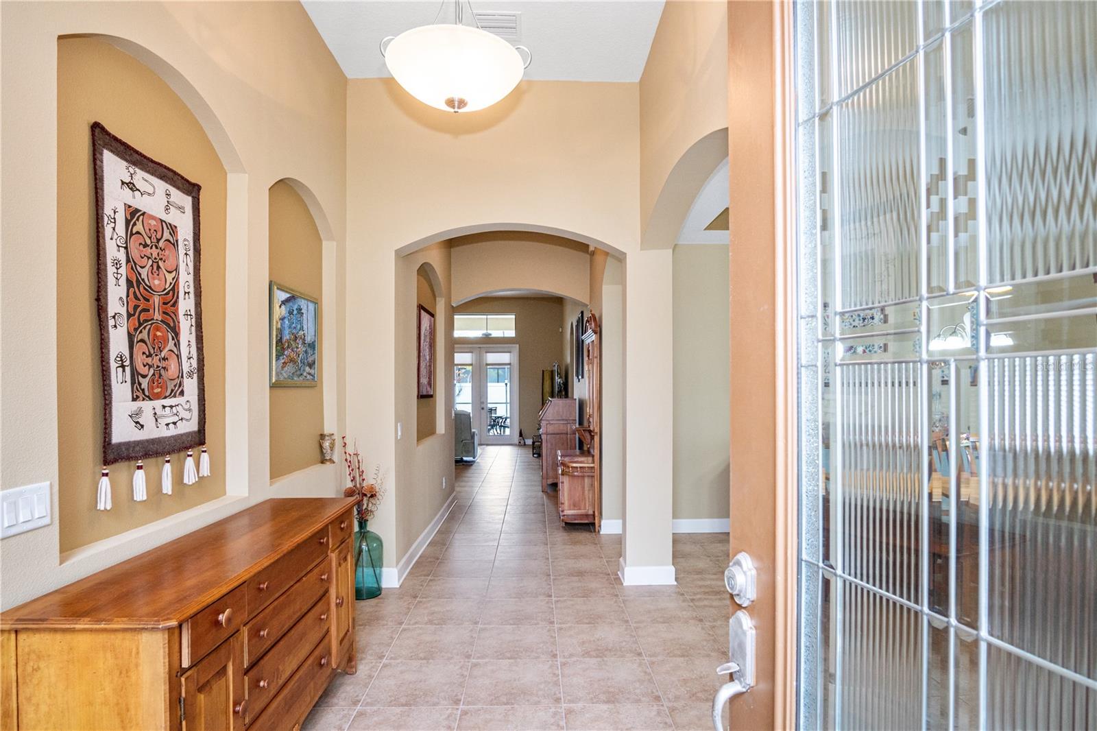 Elegant Foyer with Formal Niches