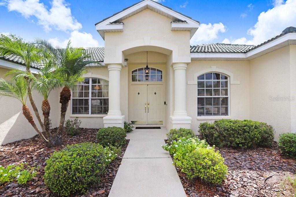 Inviting entry with double doors