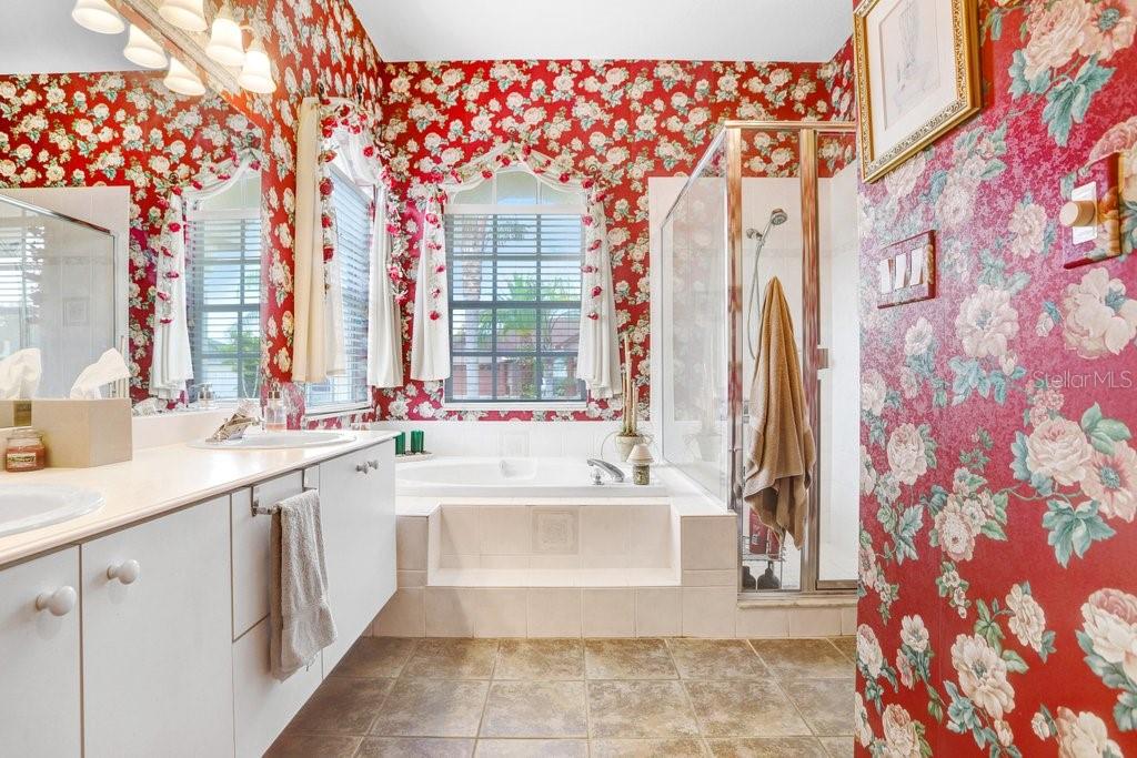 Master bathroom with garden tub and linen closet
