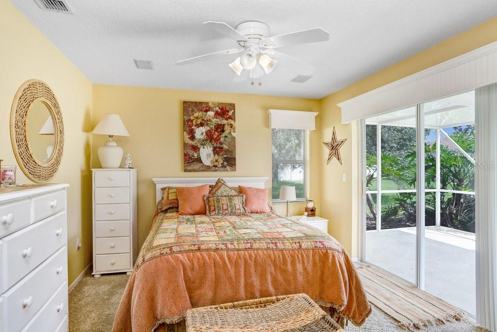 2nd bedroom suite with separate entrance at thesliding doors into the covered, screened porch