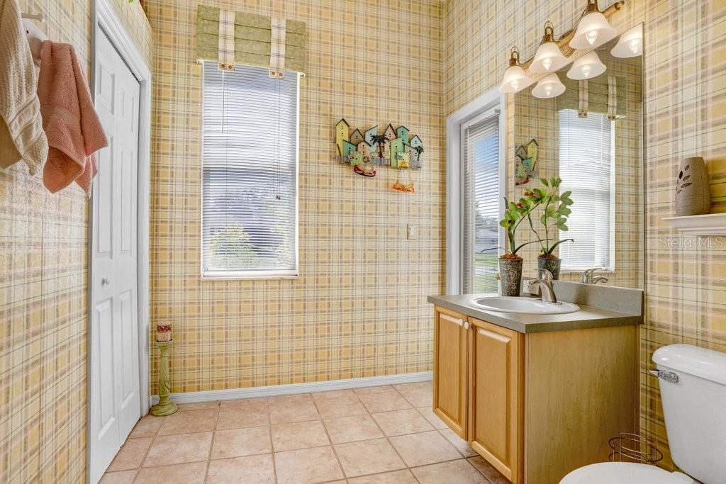 Bathroom in the immediate hall off the 2nd bedroom
