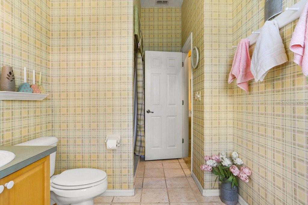 This bathroom could also serve as the pool bath with it’s separate entrance