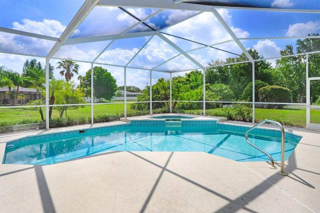 Pool with spa with plenty of deck space to lounge